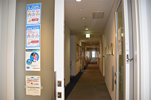 2.Open a door leading into the hallway.